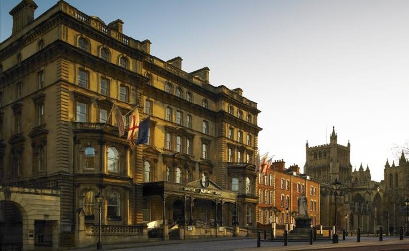 View of Bristol Marriott Royal Hotel and Queen Victoria statue with Bristol Cathedral in the background